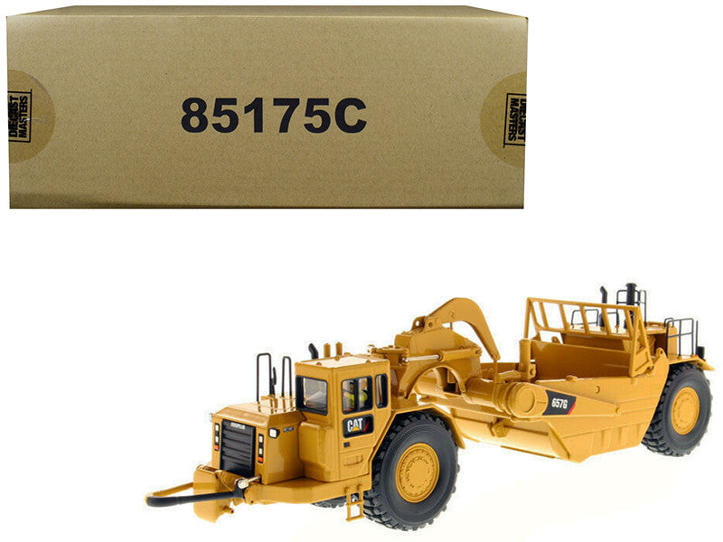 CAT Caterpillar 657 G Wheel Tractor Scraper with Operator
